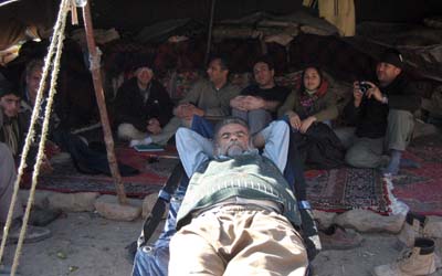 Hossein in a camping bed