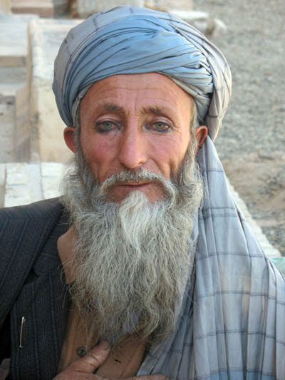 An old man with green eyes.